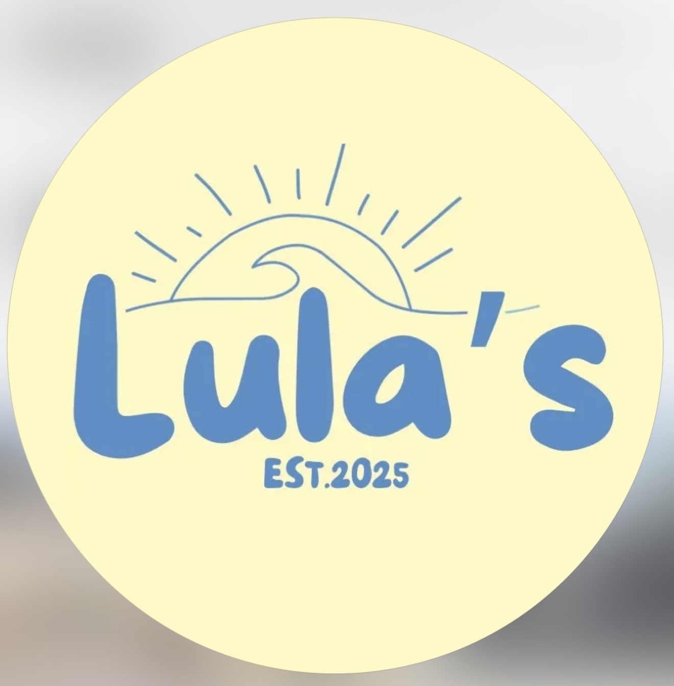 Lula's Coffee & Matcha, Est. 2025 logo — a hand-drawn sun and wave